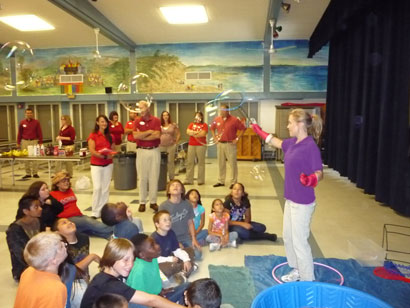 Here is a Picture taken about or representing a Best Bubble Party Birthday Boy or Girl Possibly Going Inside a Bubble at a Show For Kids, Children, Boys, and Girls as a Great Birthday Idea, School Assembly, Event, Festival, Carnival, Gathering, Picnic, Church Function, Temple Party, Bar Mitzvah, Bat Mitzvah, or Kids Party Idea.